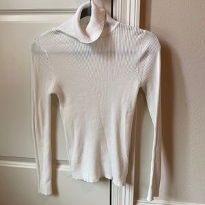 White turtleneck sweater